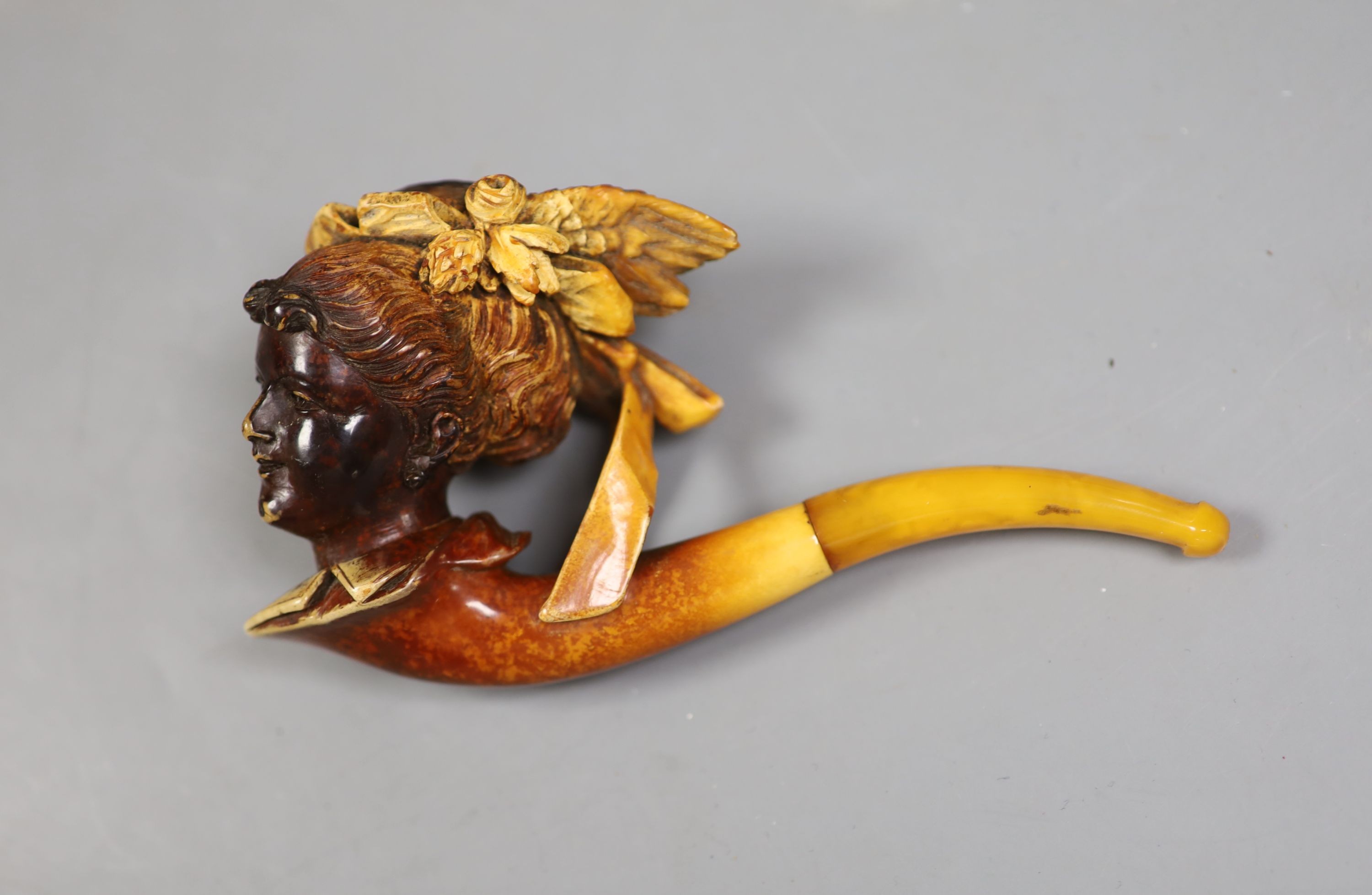 A Victorian Meerschaum pipe modelled as a lady, 13.5cm long, cased, and a Briar pipe